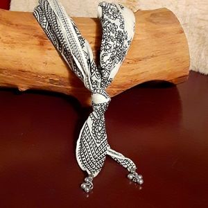 🧡 2 for $7. Bandana necklace in white and silver.